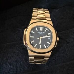 Patek Philippe Gold and Black Luxury Watch